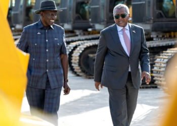 President William Ruto walks with Aliko Dangote in Lamu during an inspection of the Dangote refinery project