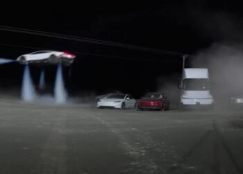 Tesla Roadster with rocket-assisted technology designed for brief aerial maneuvers