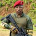 Former KDF soldier Patrick Osoi in military-style uniform and red beret.