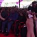 Edwin Sifuna stands to greet Njeri Maina during Martha Karua’s father’s funeral